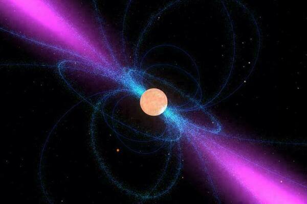 This image shows an artist's impression of a neutron star, surrounded by its strong magnetic field (blue). It emits a narrow beam of radio waves (magenta) above its magnetic poles. When the star's rotation sweeps these beams over the Earth, the neutron star can be detected as a radio pulsar.
NASA Goddard/Walt Feimer